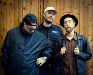 Dirty Deep band photograph featuring Victor Sbrovazzo, Adam Lanfrey and Geoffroy Sourp