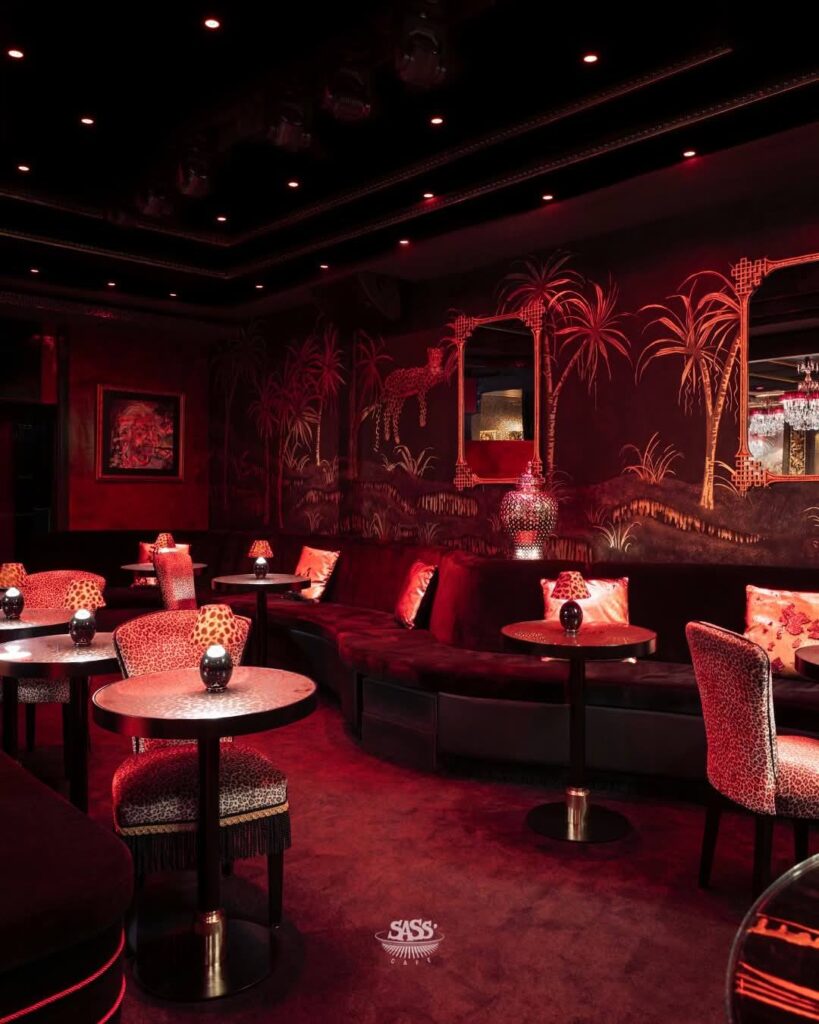 Sass Café Monaco red lounge interior for Eclipse Halloween on 31 October 2026