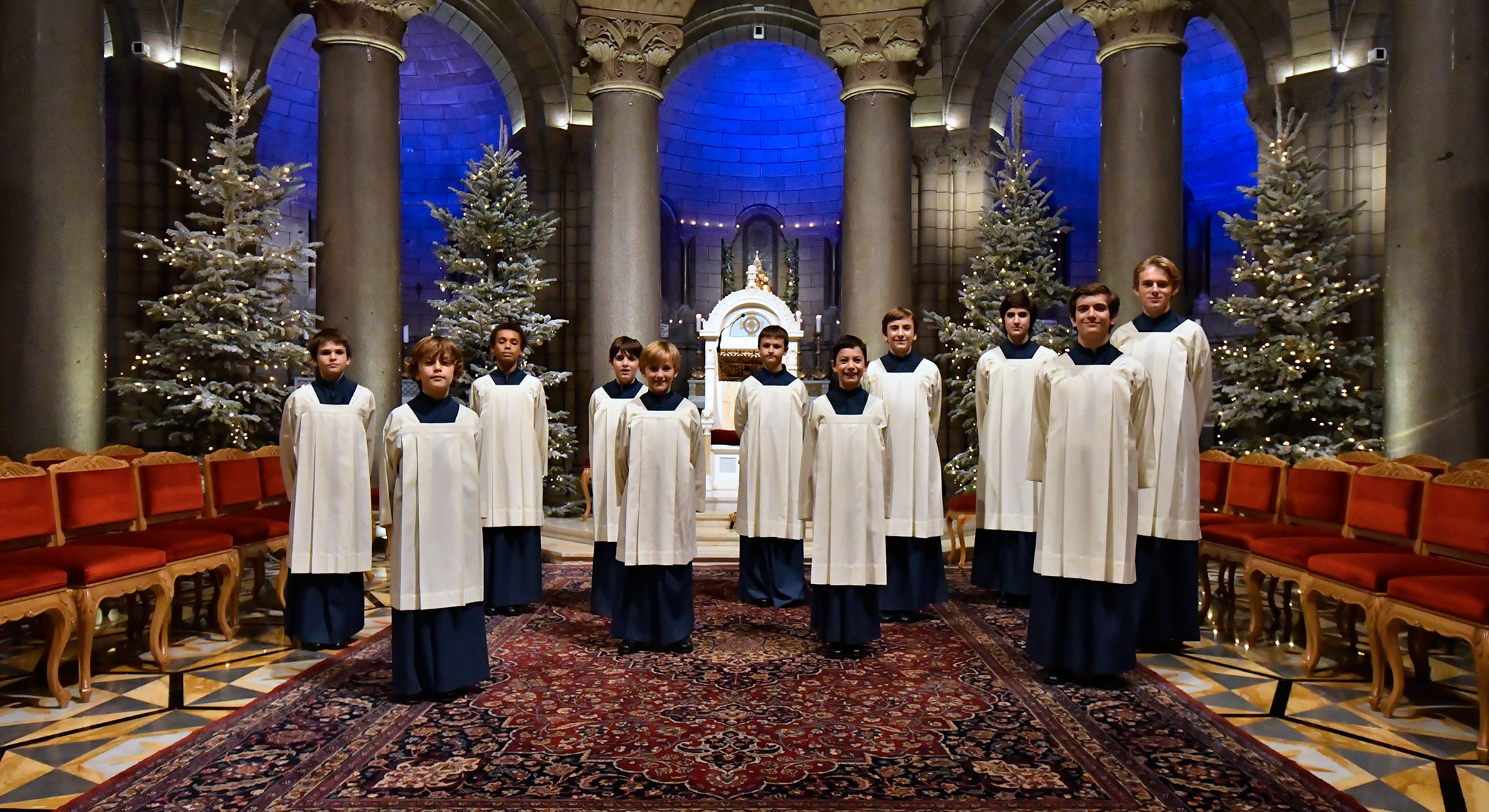 Official Monaco Cathedral Choir archival photograph inside the cathedral with Christmas decorations; illustrative image, not a photograph of the 24 December 2026 service.