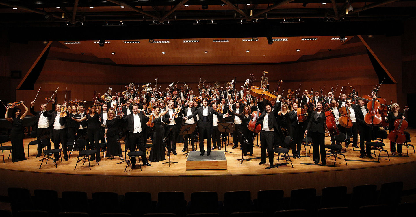 Orchestre Philharmonique de Monte-Carlo performing on stage
