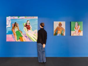 Earlier exhibition of Xevi Sola's colourful poolside paintings; illustrative of the artist, not a photograph of the Monaco 2026 exhibition